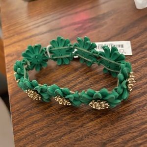 Charming Charlie costume jewelry! Kelly green flower bracelet with gold accents